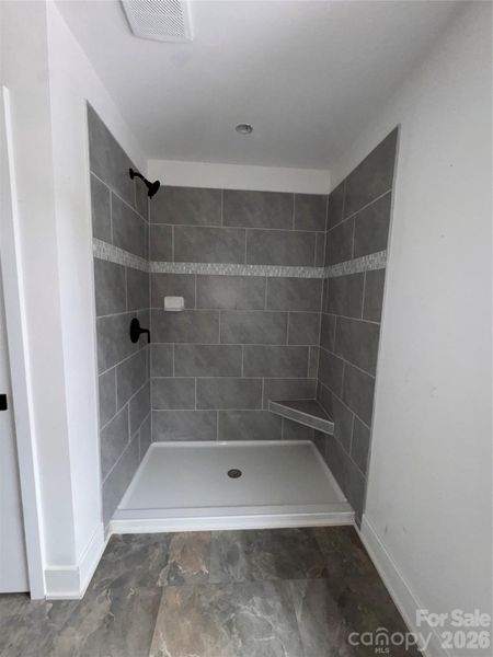 primary bathroom tiled shower