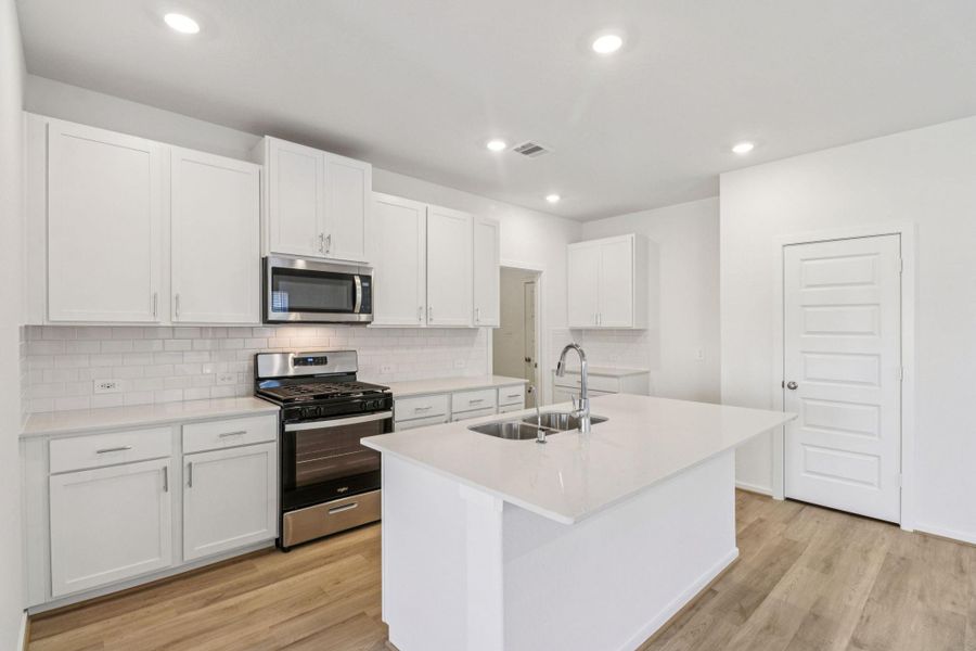 Photo is not of the actual home, but is an inspirational photo of builder’s model home and may depict options, furnishings, and/or decorator features that are not included