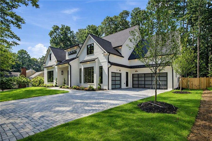 Front exterior of a new home in , Alpharetta, GA, highlighting curb appeal (Image 2). Front exterior of a new home in , Alpharetta, GA, highlighting curb appeal (Image 2).