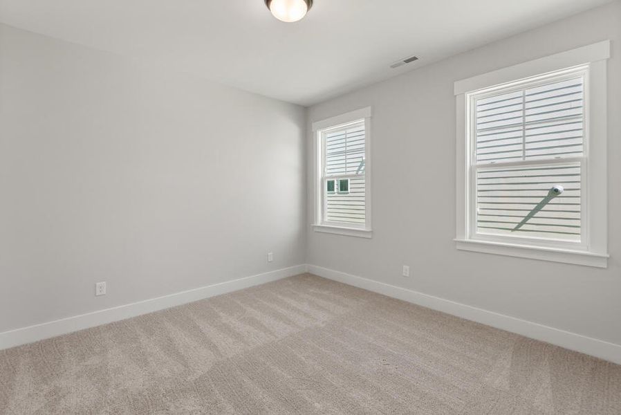 Spacious, unfurnished interior of a new home in Wexford, Elon (Image 41).