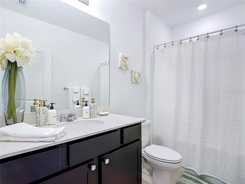 Furnished interior view inside a new home in Caloosa Cove, Labelle (Image 8).