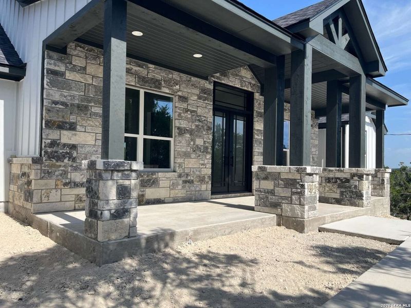 Exterior details and patio area of a home in , Fischer (Image 13). Exterior details and patio area of a home in , Fischer (Image 13).