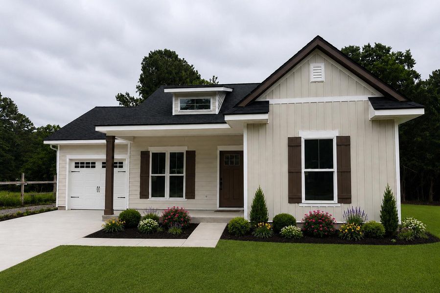 Front exterior of a new home in , Holly Hill, SC, highlighting curb appeal (Image 1). Front exterior of a new home in , Holly Hill, SC, highlighting curb appeal (Image 1).