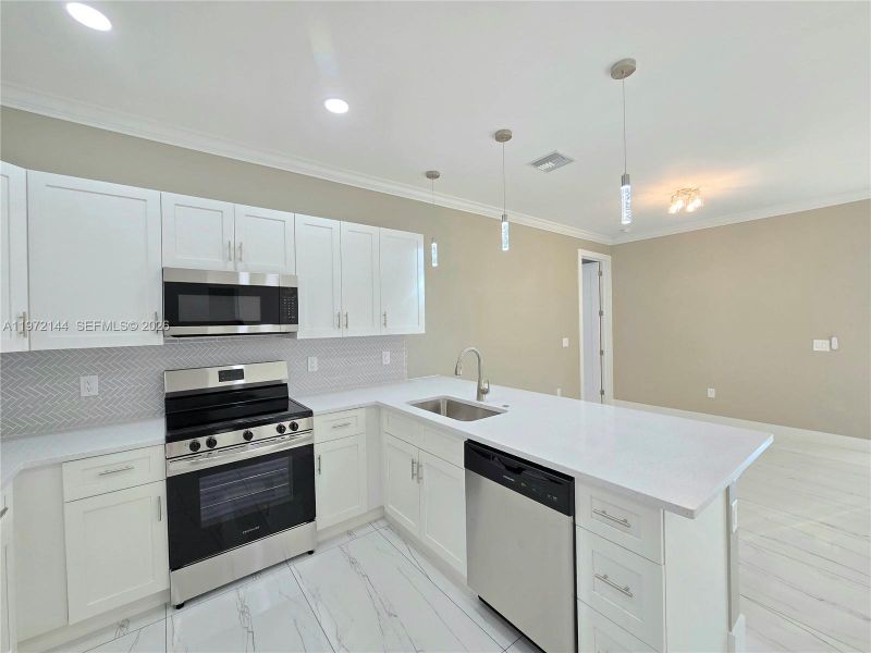 Furnished interior view inside a new home in , Lehigh Acres (Image 10).