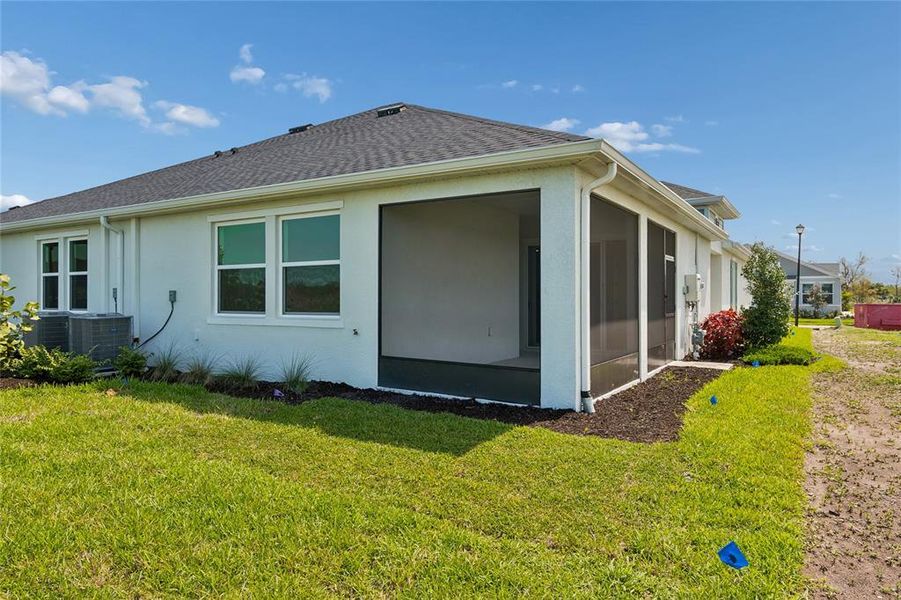 Exterior details and patio area of a home in Gracewater at Sarasota, Sarasota (Image 25).