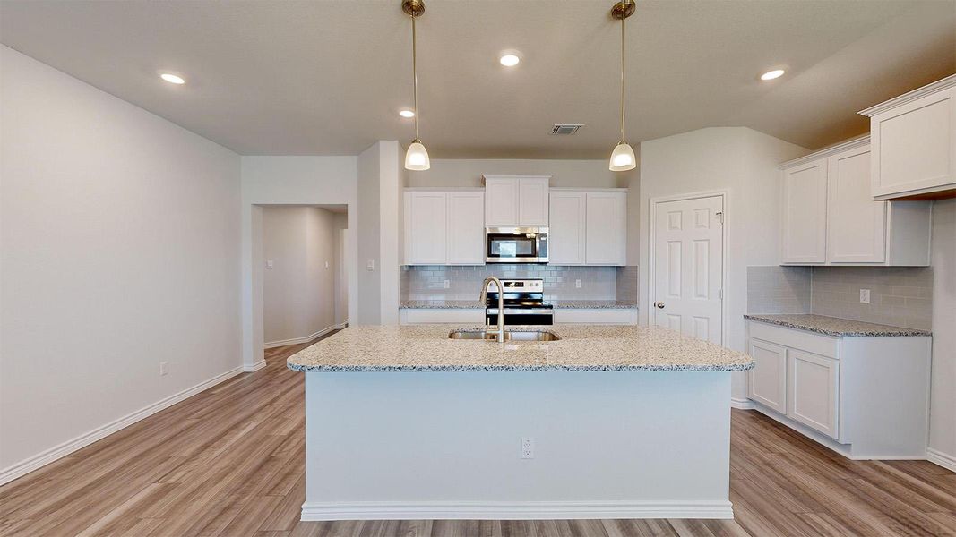 Furnished interior view inside a new home in Creekfall, Burnet (Image 5).