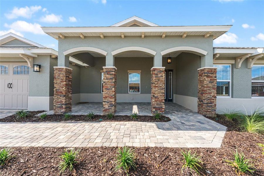Front exterior of a new home in , Ocala, FL, highlighting curb appeal (Image 27). Front exterior of a new home in , Ocala, FL, highlighting curb appeal (Image 27).