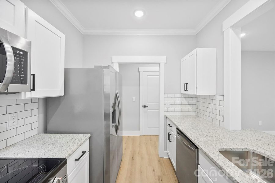 Furnished interior view inside a new home in , Albemarle (Image 14).