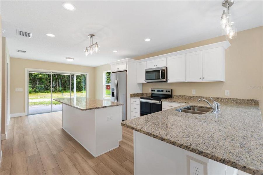 Furnished interior view inside a new home in , Bushnell (Image 5).