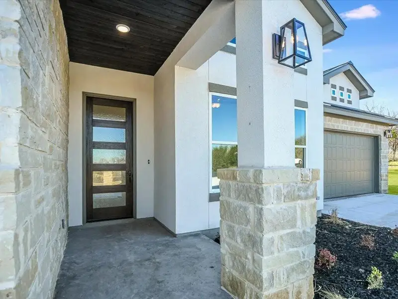 Exterior details and patio area of a home in , Horseshoe Bay (Image 3).