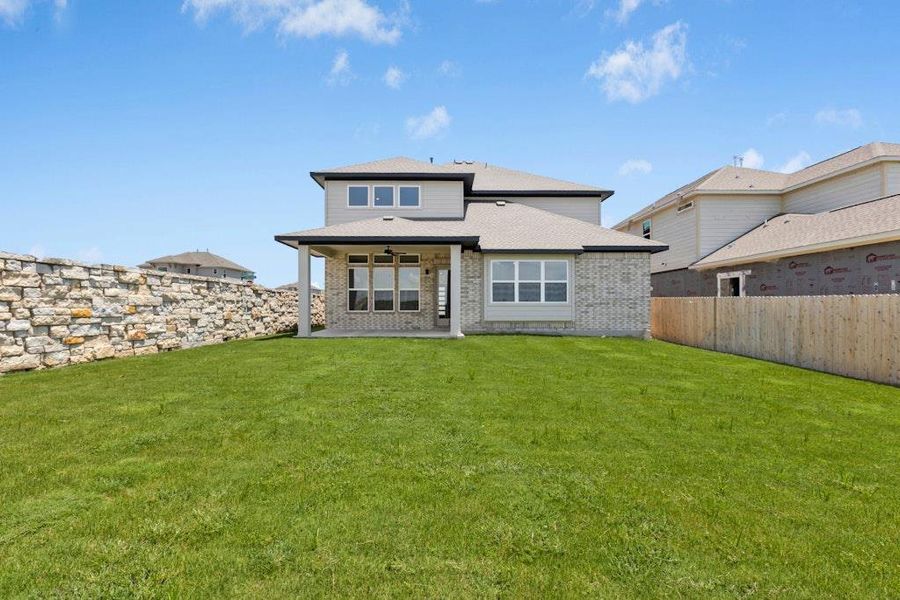 Front exterior of a new home in University Heights, Round Rock, TX, highlighting curb appeal (Image 20).