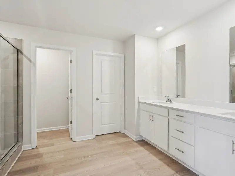 Furnished interior view inside a new home in Harmony Manor, Fairburn (Image 9).