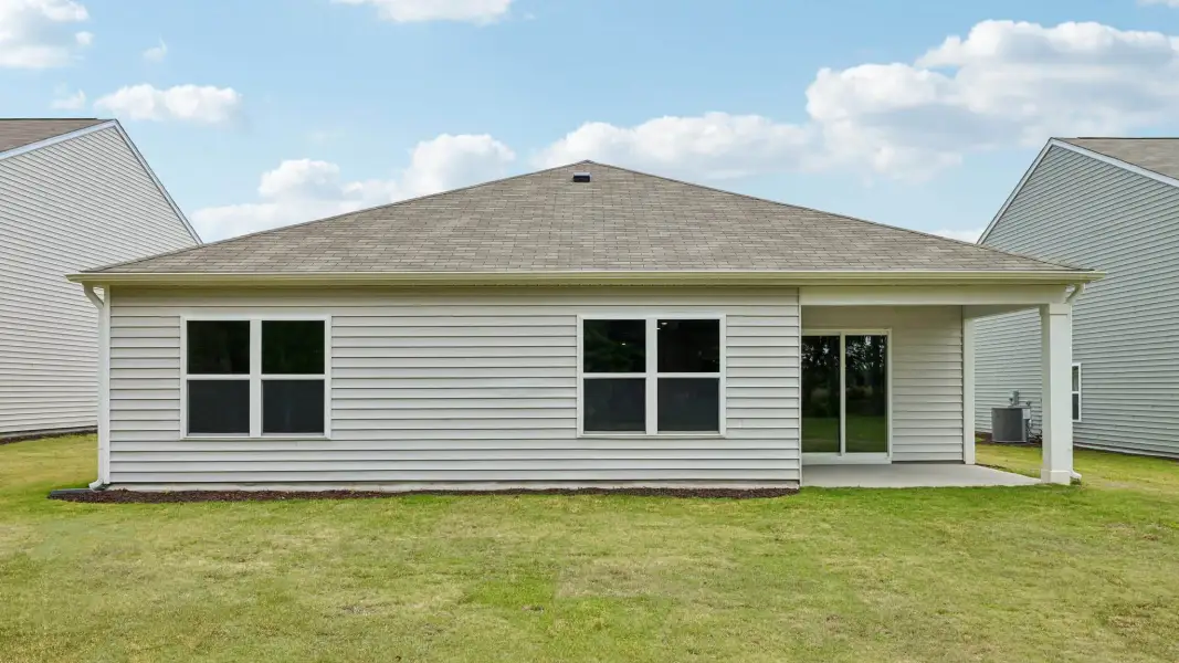 Exterior details and patio area of a home in Mangum Farms, Stem (Image 22).