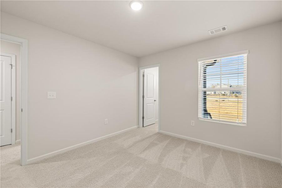 Spacious, unfurnished interior of a new home in Lake Carlton, Loganville (Image 15).