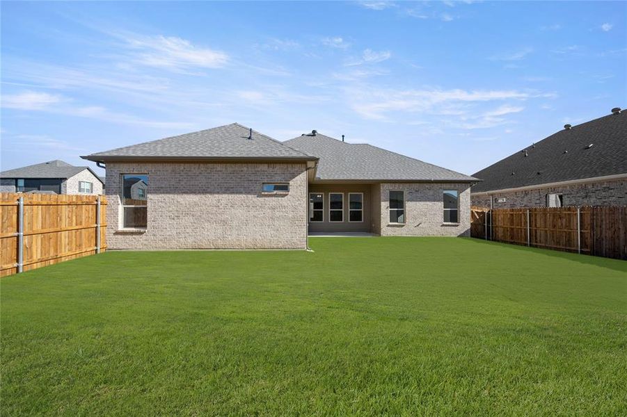 Large enough to consider adding a pool to this backyard retreat.