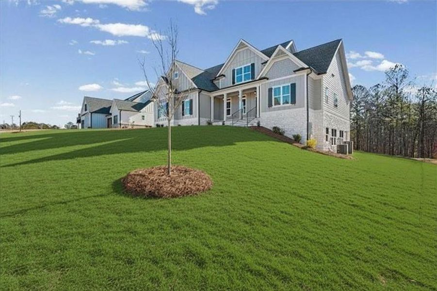 Front exterior of a new home in , Waleska, GA, highlighting curb appeal (Image 22). Front exterior of a new home in , Waleska, GA, highlighting curb appeal (Image 22).