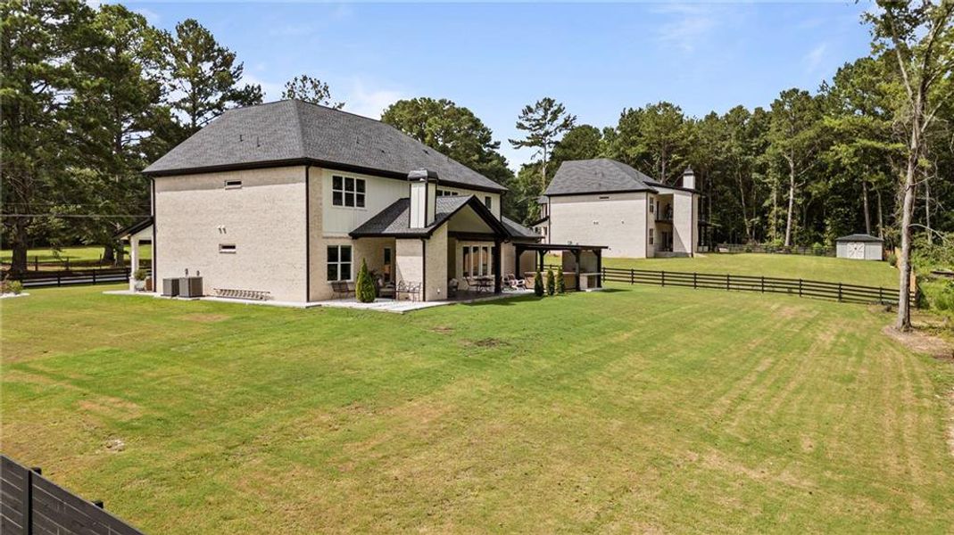 Front exterior of a new home in , Lawrenceville, GA, highlighting curb appeal (Image 18).