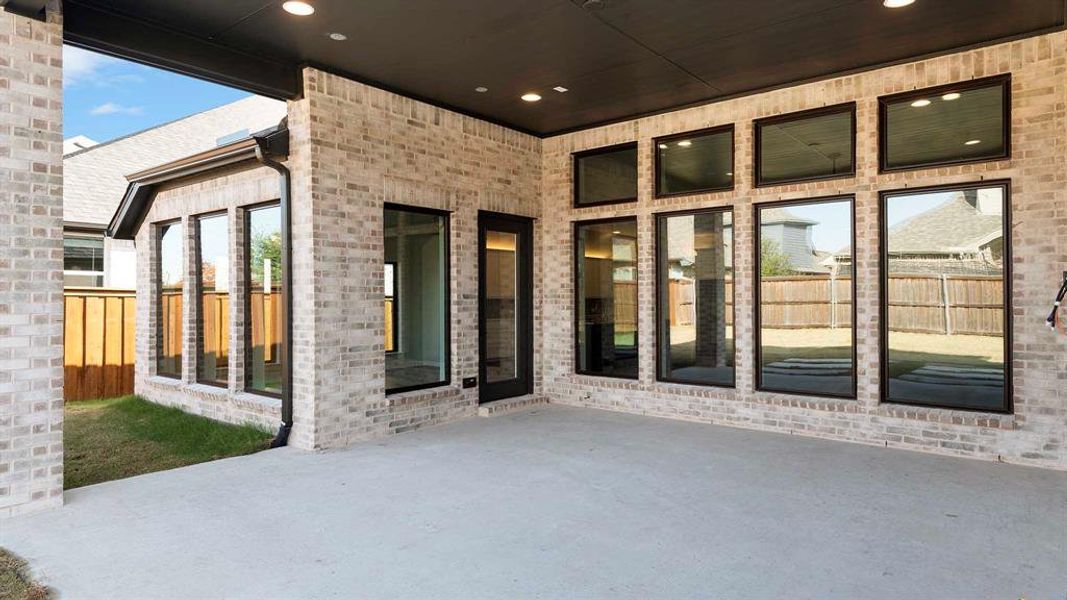 Exterior details and patio area of a home in Trinity Falls, McKinney (Image 3). Exterior details and patio area of a home in Trinity Falls, McKinney (Image 3).