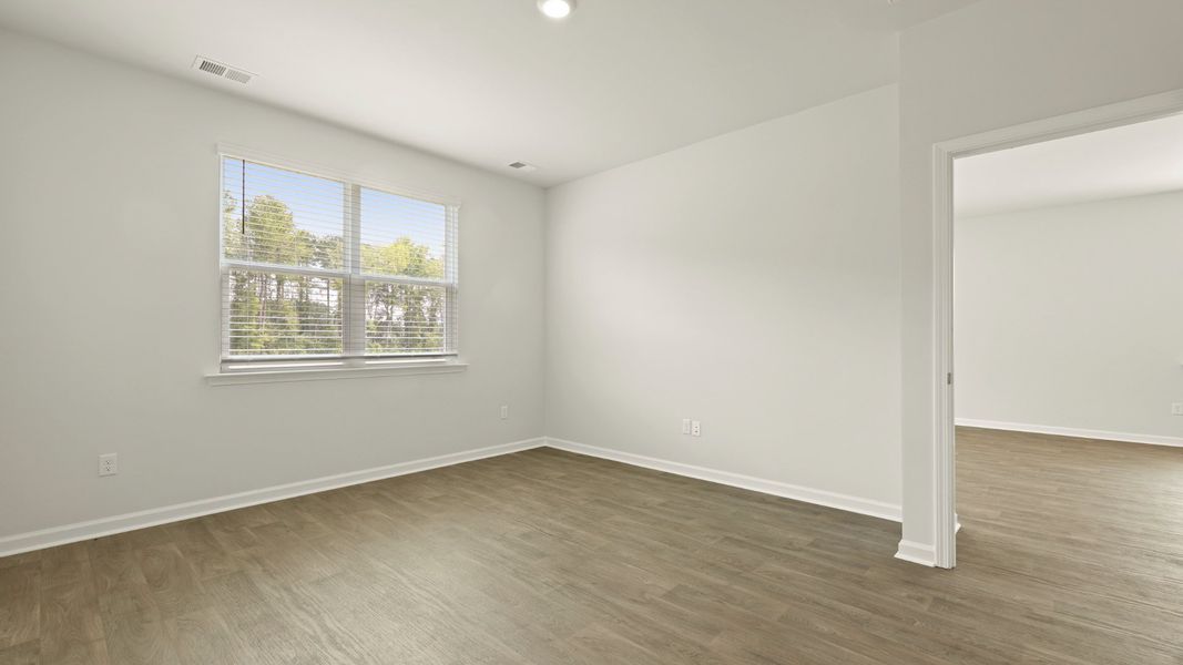Spacious, unfurnished interior of a new home in Pine Hills at Cane Bay, Summerville (Image 14). Spacious, unfurnished interior of a new home in Pine Hills at Cane Bay, Summerville (Image 14).