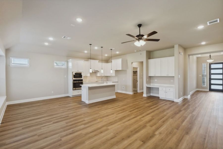 Representative unfurnished interior of a home built from the Addison by Chesmar Homes in Summer Crest, Crowley (Image 10).