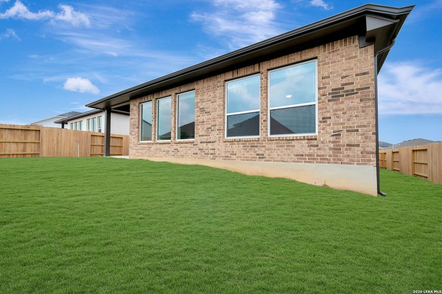 Exterior details and patio area of a home in Meyer Ranch – Select Reserve Series, New Braunfels (Image 4).