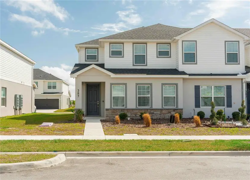 Front exterior of a new home in , St. Cloud, FL, highlighting curb appeal (Image 1). Front exterior of a new home in , St. Cloud, FL, highlighting curb appeal (Image 1).