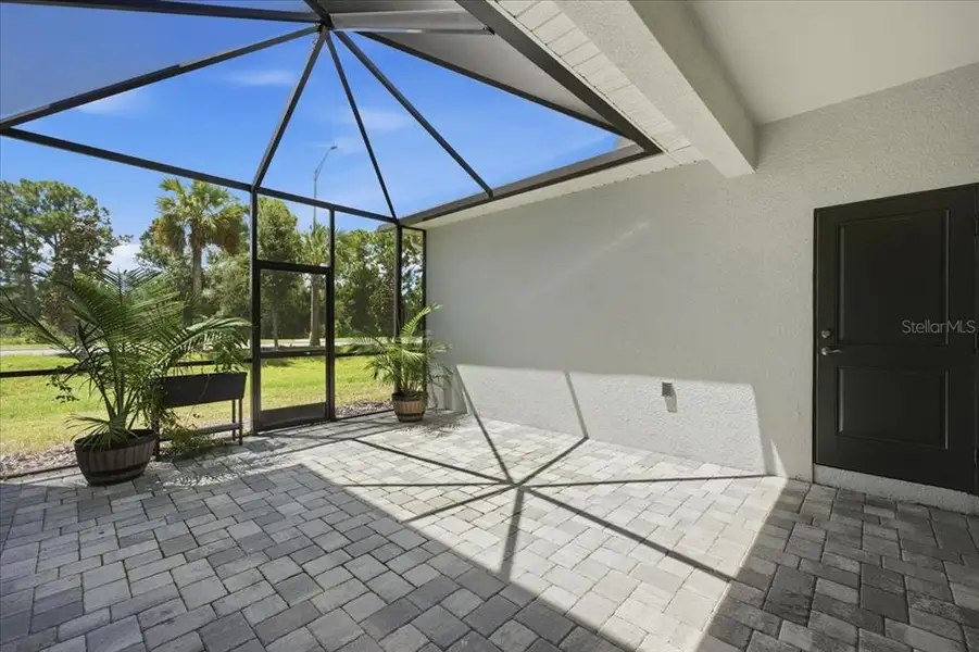 Exterior details and patio area of a home in , Sarasota (Image 3).