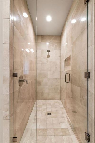 Bathroom featuring a stall shower and recessed lighting Bathroom featuring a stall shower and recessed lighting