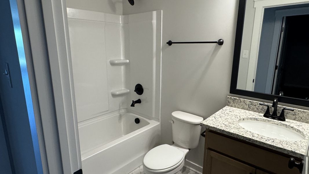 Furnished interior view inside a new home in The Greens at Legacy Townhomes, Springfield (Image 10).