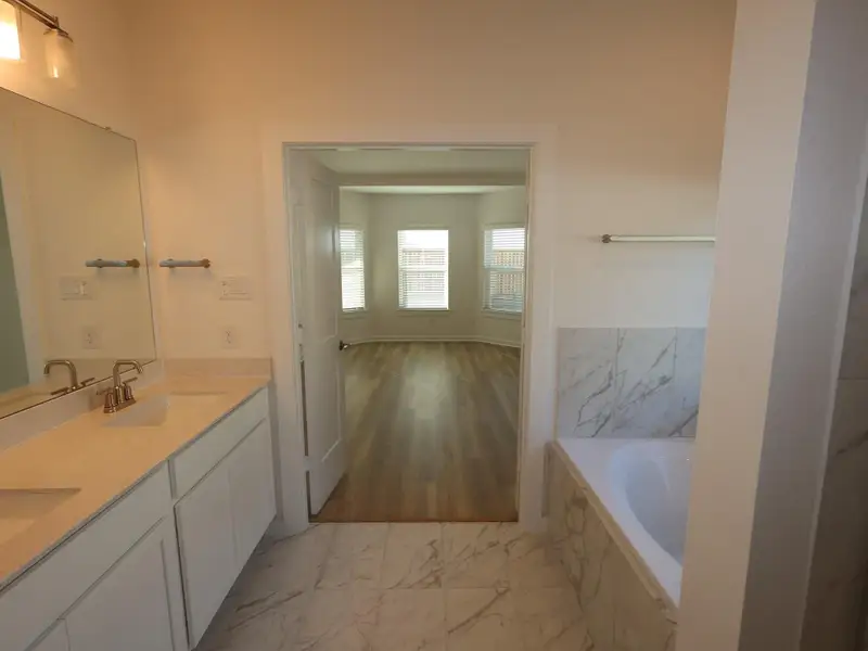 Furnished interior view inside a new home in Marvida, Cypress (Image 10).