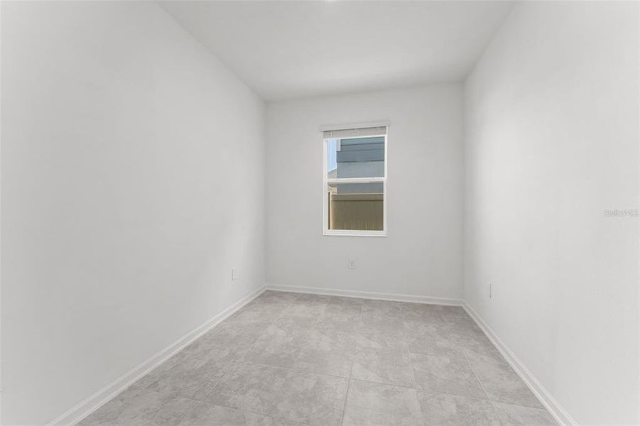 Spacious, unfurnished interior of a new home in Peace Creek Reserve, Winter Haven (Image 29).
