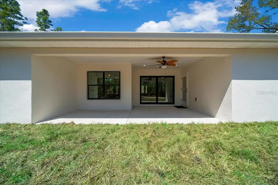 Exterior details and patio area of a home in , Ocala (Image 4).