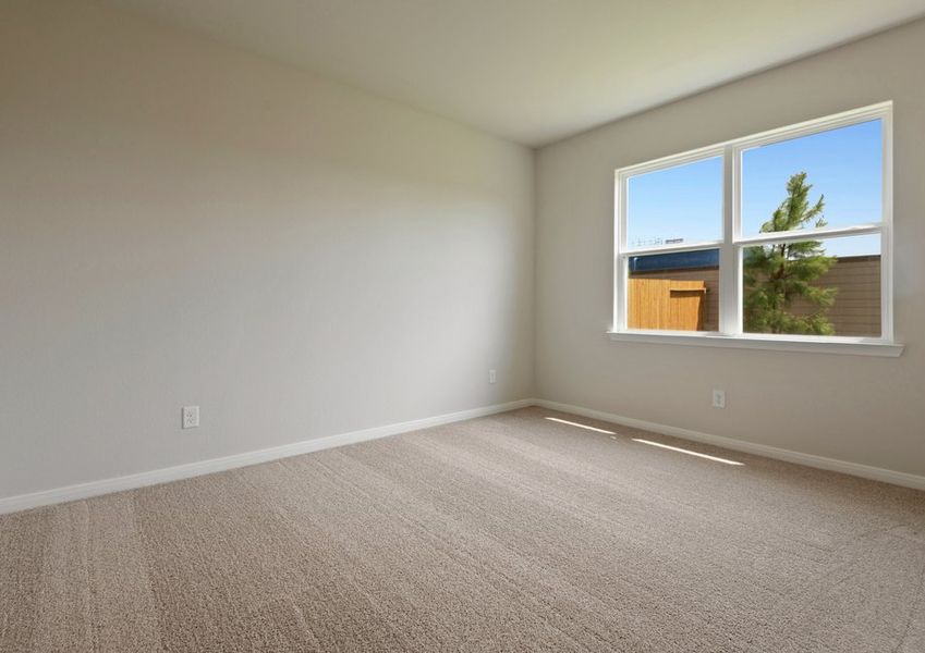 Master bedroom with carpet flooring