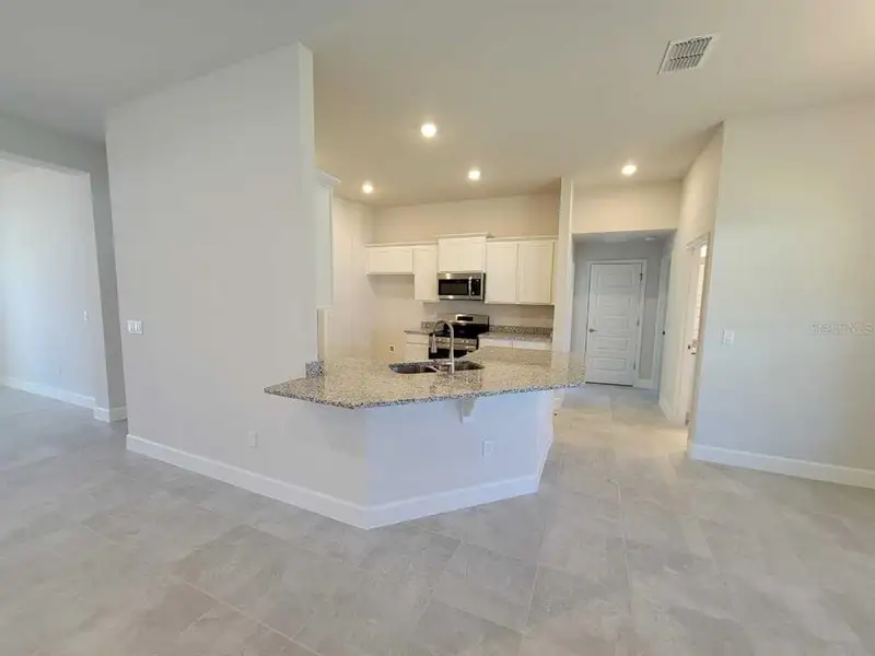 Furnished interior view inside a new home in Marion Oaks, Ocala (Image 4).
