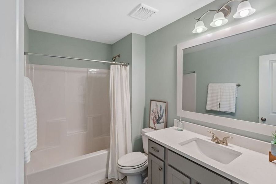 Furnished interior view inside a new home in Osprey Landing, Southport (Image 34).