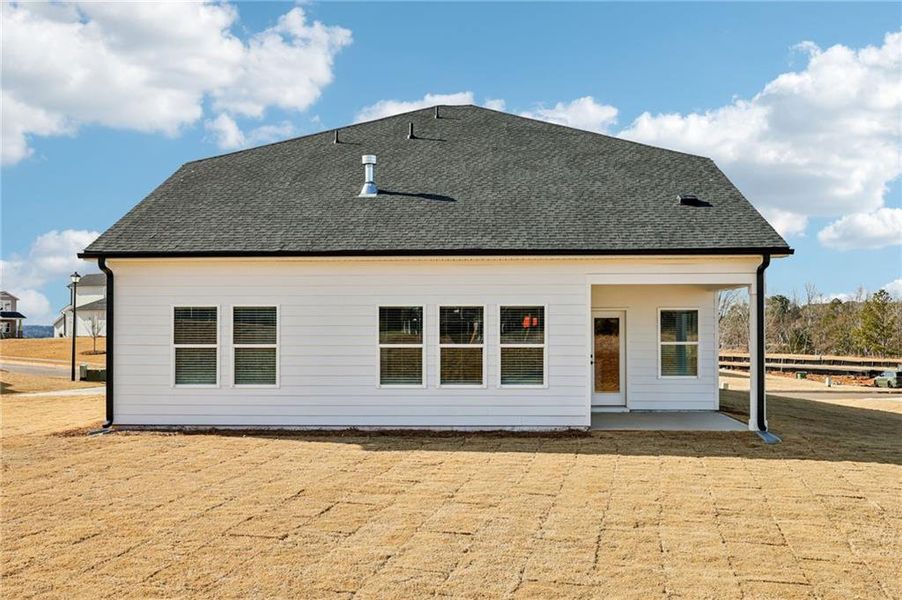 Exterior details and patio area of a home in River Pointe, Monroe (Image 4).