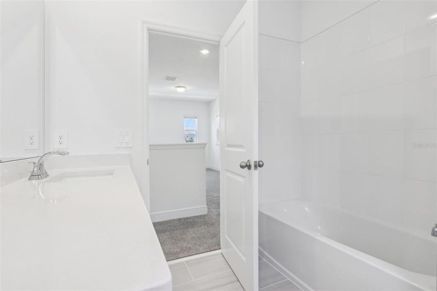 Furnished interior view inside a new home in Cyrene at Minneola - Villas, Montverde (Image 10).