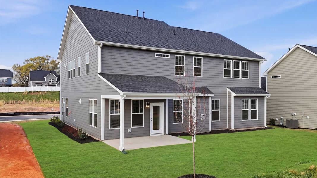 Exterior details and patio area of a home in Kayfield at Midway, Anderson (Image 4).