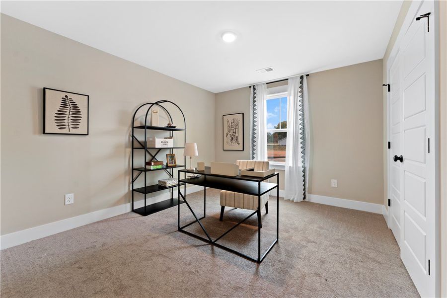 Bedroom 3. Staged for photography—furniture and décor not included