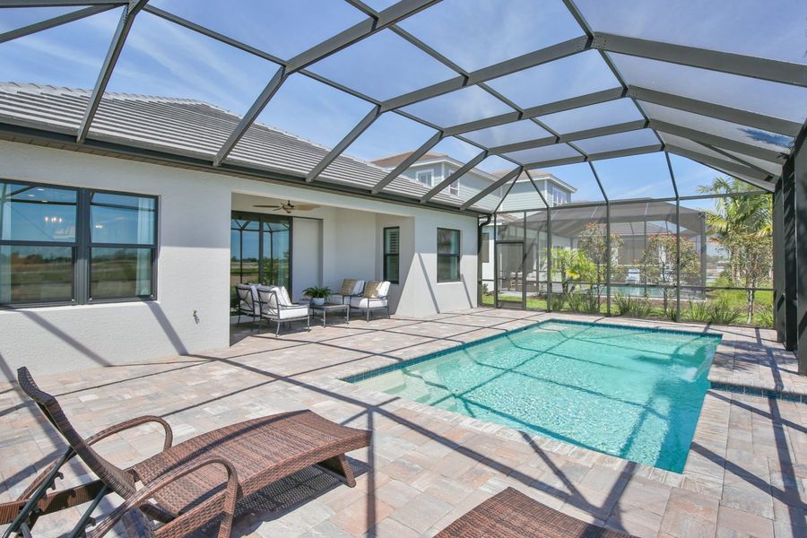 Exterior details and patio area of a home in Palm Grove, Lakewood Ranch (Image 3).
