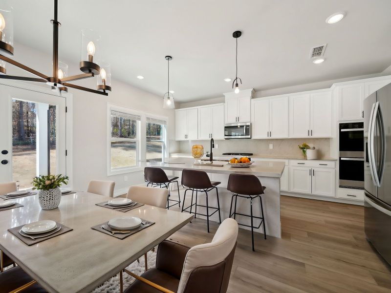 Furnished interior view inside a new home in Martin Springs - Estate Series, Lawrenceville (Image 3).