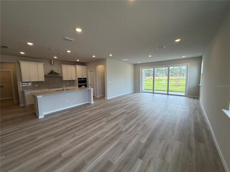 Spacious, unfurnished interior of a new home in The Cypress Series at Reserve East, Flagler Beach (Image 17).