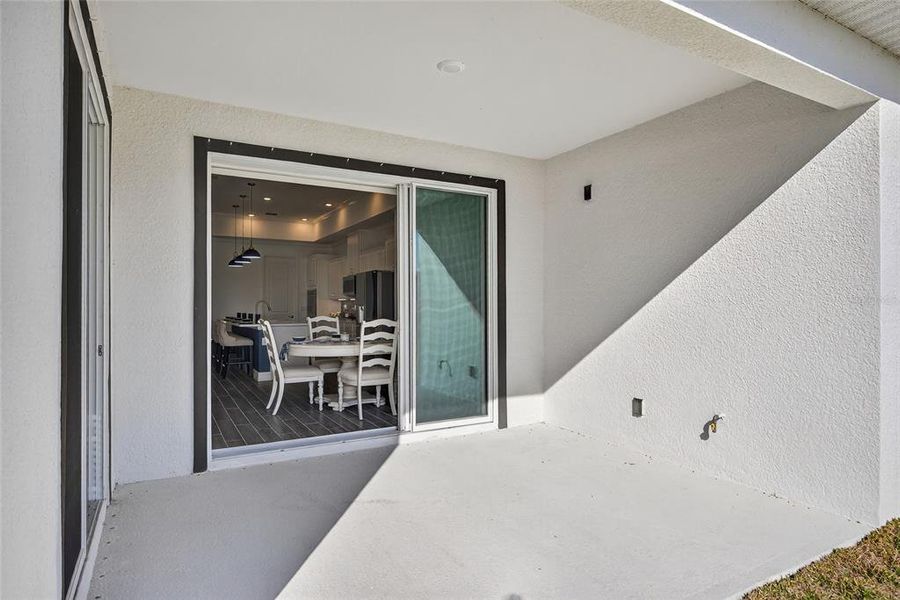 Exterior details and patio area of a home in Heritage Station, Punta Gorda (Image 4).
