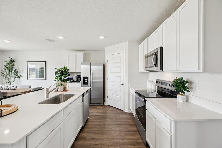 Furnished interior view inside a new home in Leoma's Landing, Lake Wales (Image 12).