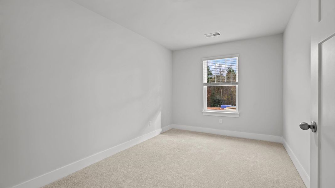 First-class bedroom with generous proportions, a walk-in closet, and beautiful natural light through large windows First-class bedroom with generous proportions, a walk-in closet, and beautiful natural light through large windows