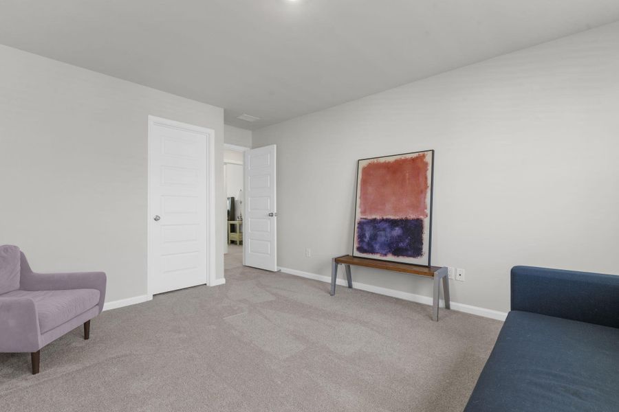 Furnished interior view inside a new home in Sweetgrass at Summers Corner, Summerville (Image 46).