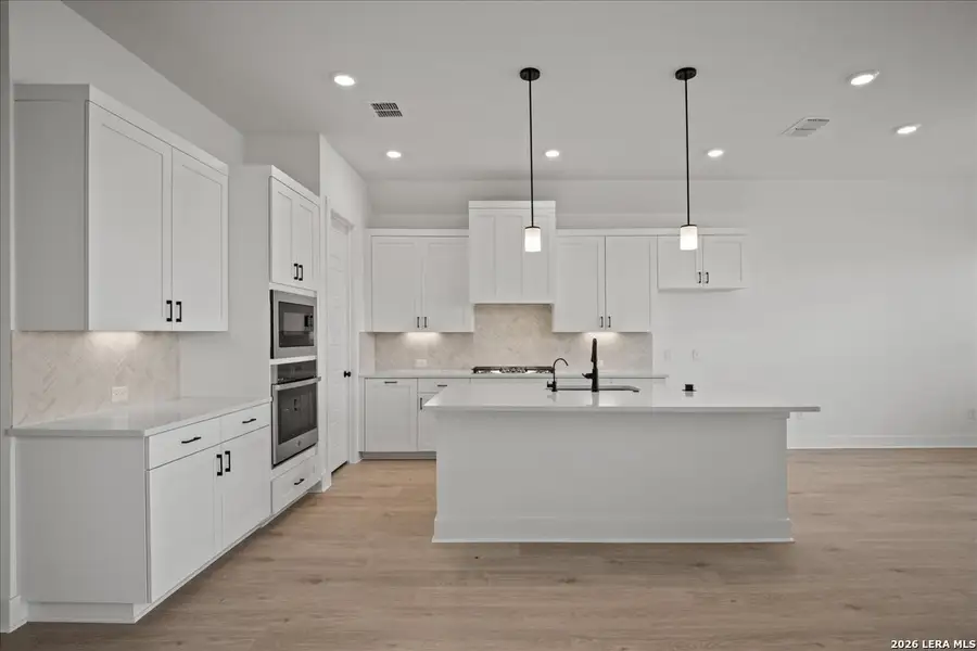 Furnished interior view inside a new home in Village at Three Oaks, Seguin (Image 5).