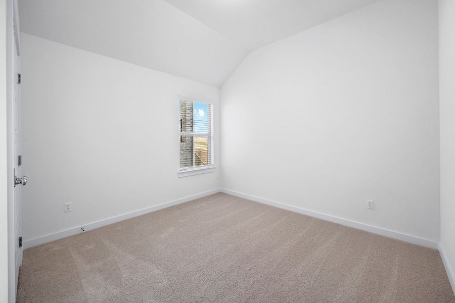 Bedroom in the Cypress home plan by Trophy Signature Homes - REPRESENTATIVE PHOTO Bedroom in the Cypress home plan by Trophy Signature Homes - REPRESENTATIVE PHOTO