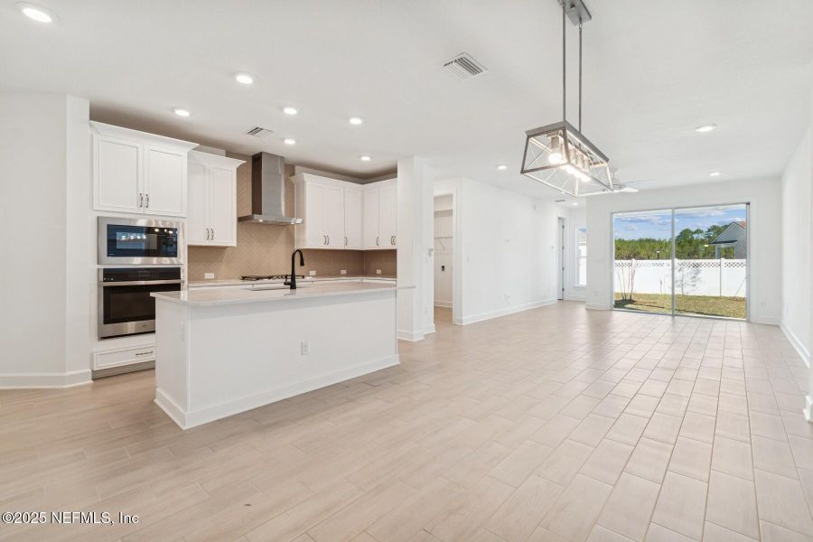 Furnished interior view inside a new home in Evergreen Island at Silverleaf - Classic, St. Augustine (Image 8).