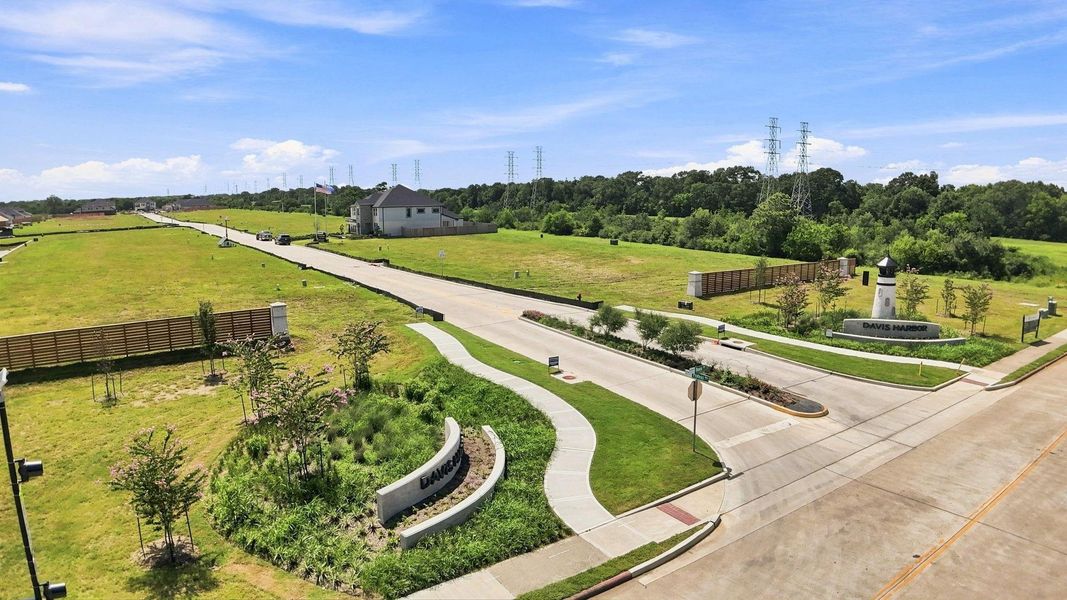 Community entrance with the monument of a lighthouse. Community entrance with the monument of a lighthouse.